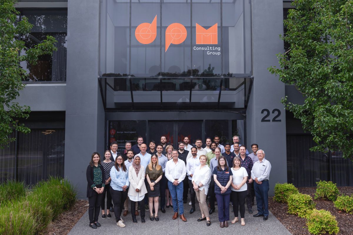 aerial view of DPM Consulting Group team standing in front of offices